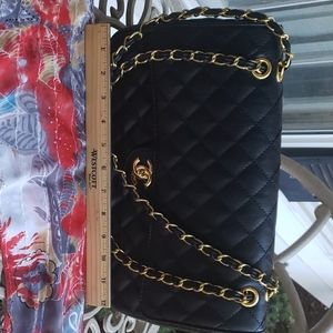 Chanel handbag. Knock off high prices &pay less.